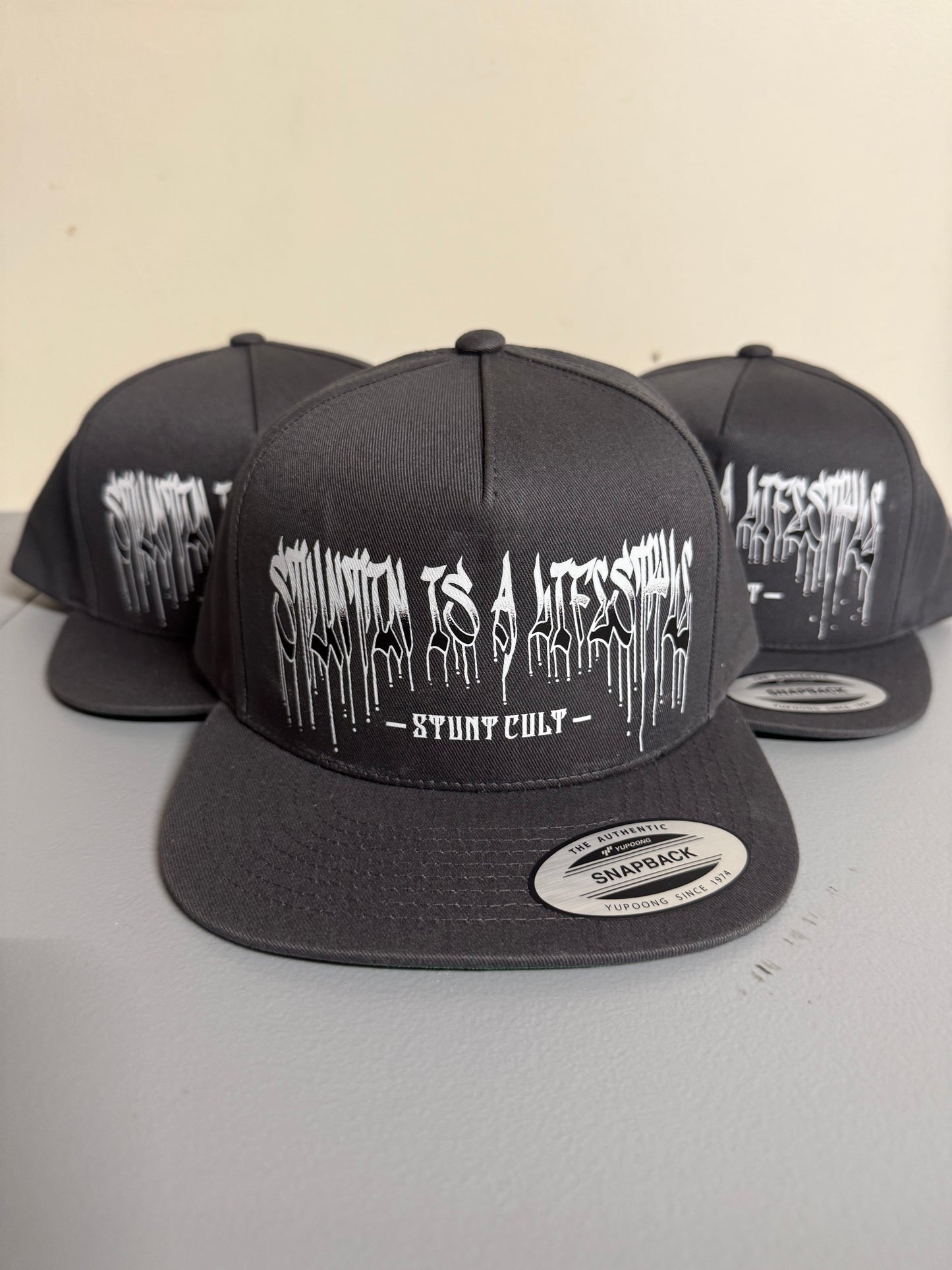 Stuntin is a Lifestyle “gray” SnapBack